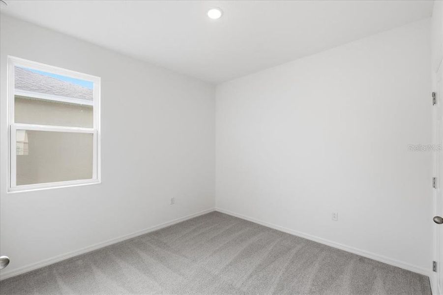 Spacious, unfurnished interior of a new home in Highfield at Twisted Oaks, Wildwood (Image 14).
