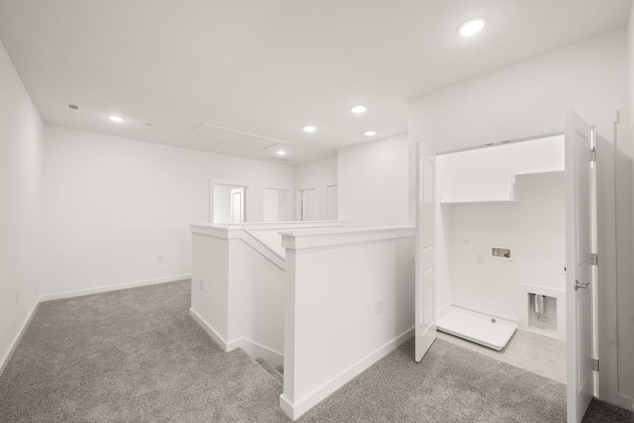 Spacious, unfurnished interior of a new home in Wildridge, Oak Point (Image 19).