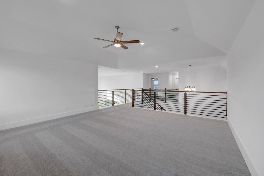 Spacious, unfurnished interior of a new home in Lone Star Landing, Montgomery (Image 40).