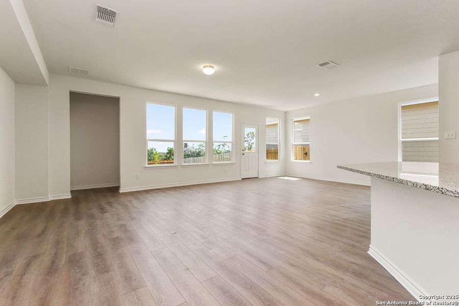 Spacious, unfurnished interior of a new home in Hidden Bluffs at TRP, San Antonio (Image 5).