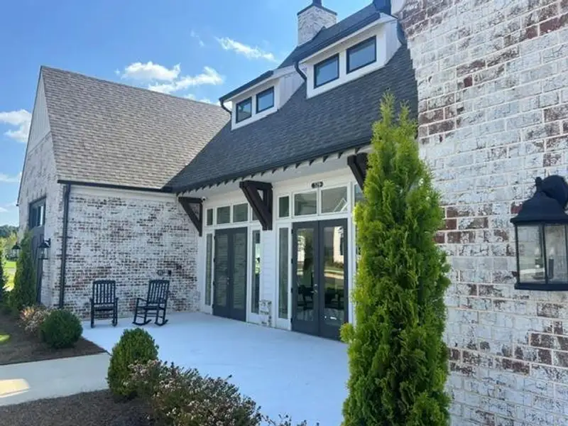 Exterior details and patio area of a home in Promenade at Sawnee Village, Cumming (Image 4).