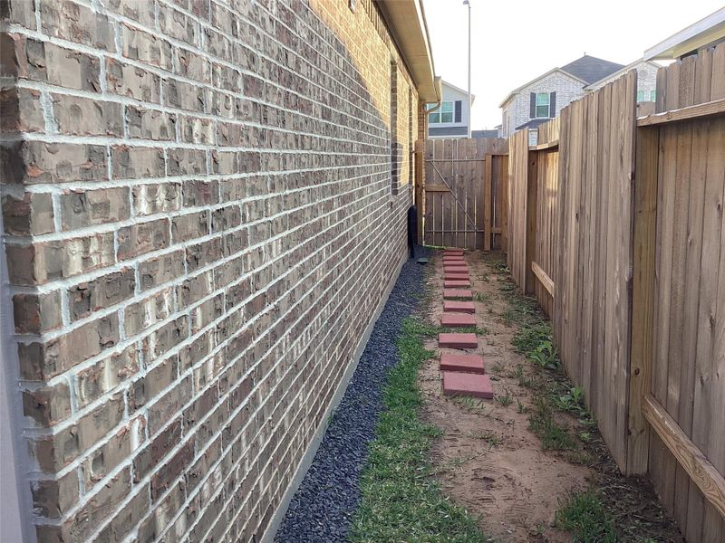 Exterior details and patio area of a home in Willow Trace 45' at Willow Trace, Spring (Image 2).