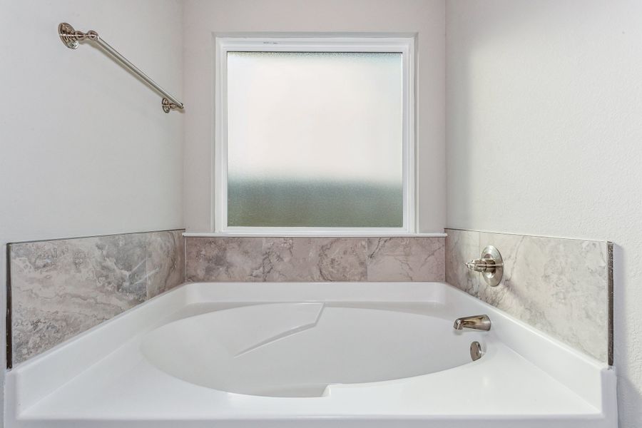 Representative furnished interior of a home built from the The Carlos by Herbst Homes in Doyle Hawkins Landing, Navarre (Image 68).