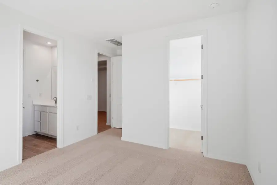 Spacious, unfurnished interior of a new home in Marbella at Windrose, Waddell (Image 43). Spacious, unfurnished interior of a new home in Marbella at Windrose, Waddell (Image 43).