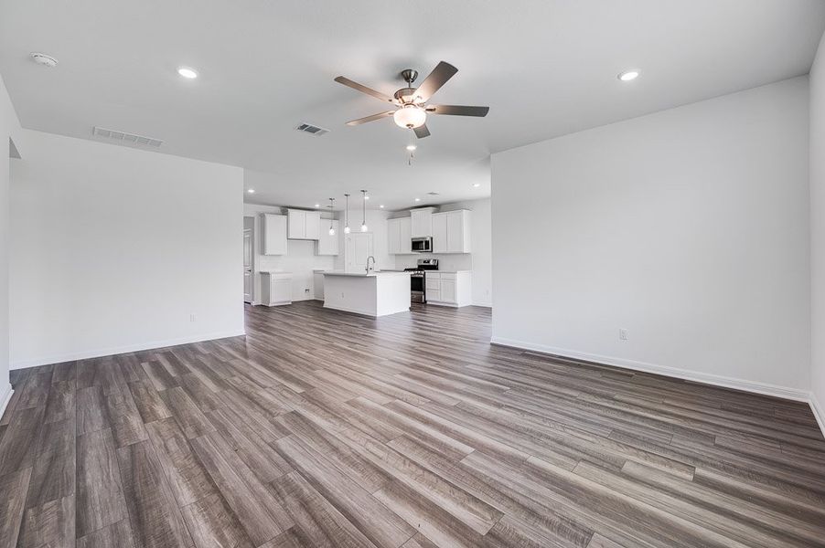 Representative unfurnished interior of a home built from the Oriole by Taylor Morrison in Emory Crossing 50s, Hutto (Image 8). Representative unfurnished interior of a home built from the Oriole by Taylor Morrison in Emory Crossing 50s, Hutto (Image 8).