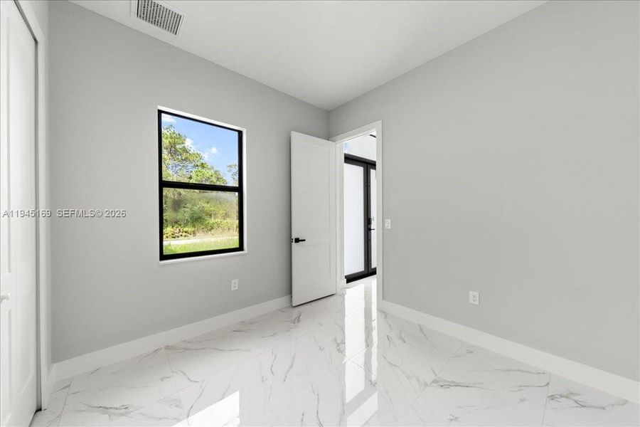 Spacious, unfurnished interior of a new home in , Lehigh Acres (Image 25).