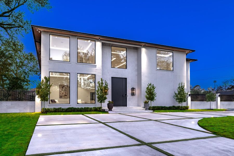 Angular exterior view highlighting the home’s architectural depth. Angular exterior view highlighting the home’s architectural depth.