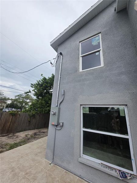 Exterior details and patio area of a home in , Holiday (Image 3).