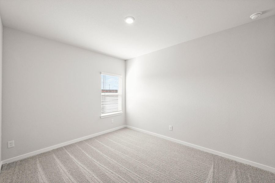 Spacious, unfurnished interior of a new home in Sunterra, Katy (Image 25).