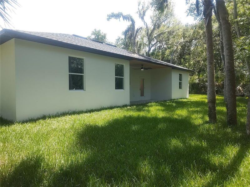 Exterior details and patio area of a home in , New Smyrna Beach (Image 3).