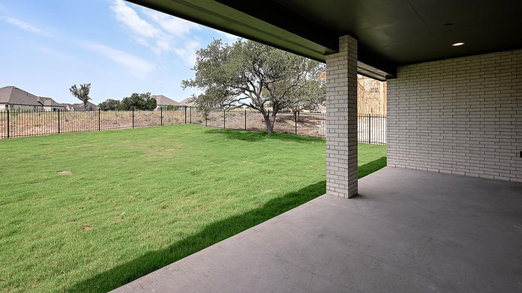 View of yard with a patio area