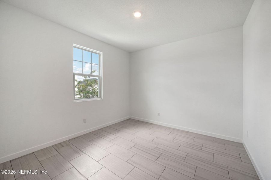 Spacious, unfurnished interior of a new home in Lakes at Bella Lago - Signature Series, Green Cove Springs (Image 14).