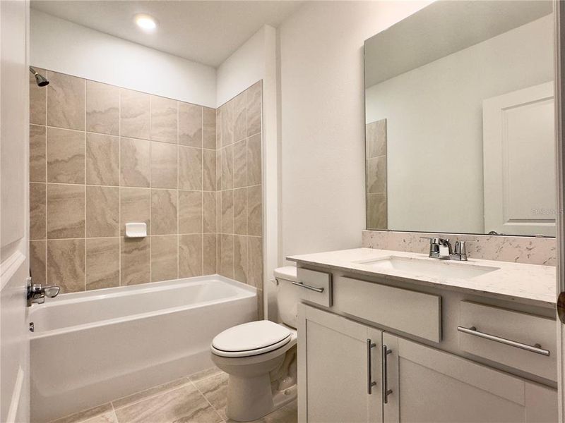 Furnished interior view inside a new home in Parkside Trails, Clermont (Image 4).