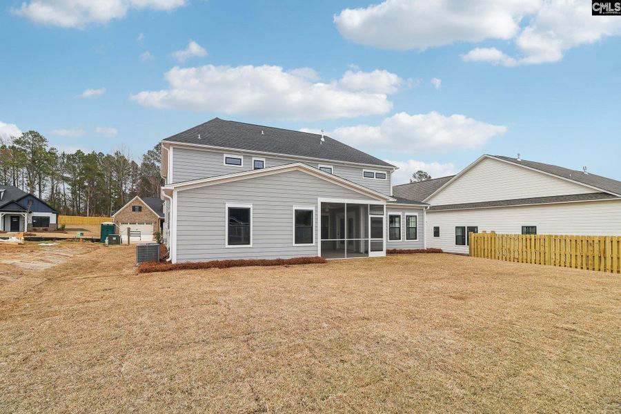 Exterior details and patio area of a home in Collins Cove, Chapin (Image 17). Exterior details and patio area of a home in Collins Cove, Chapin (Image 17).