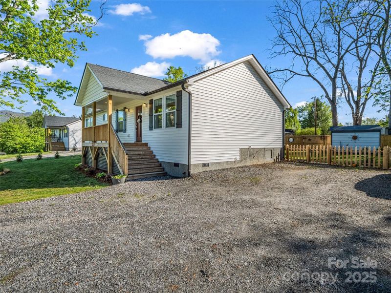 Exterior details and patio area of a home in , Black Mountain (Image 19).