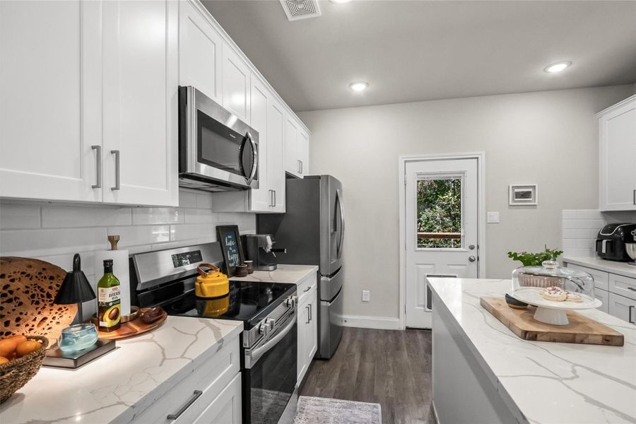 Furnished interior view inside a new home in , Conroe (Image 25).