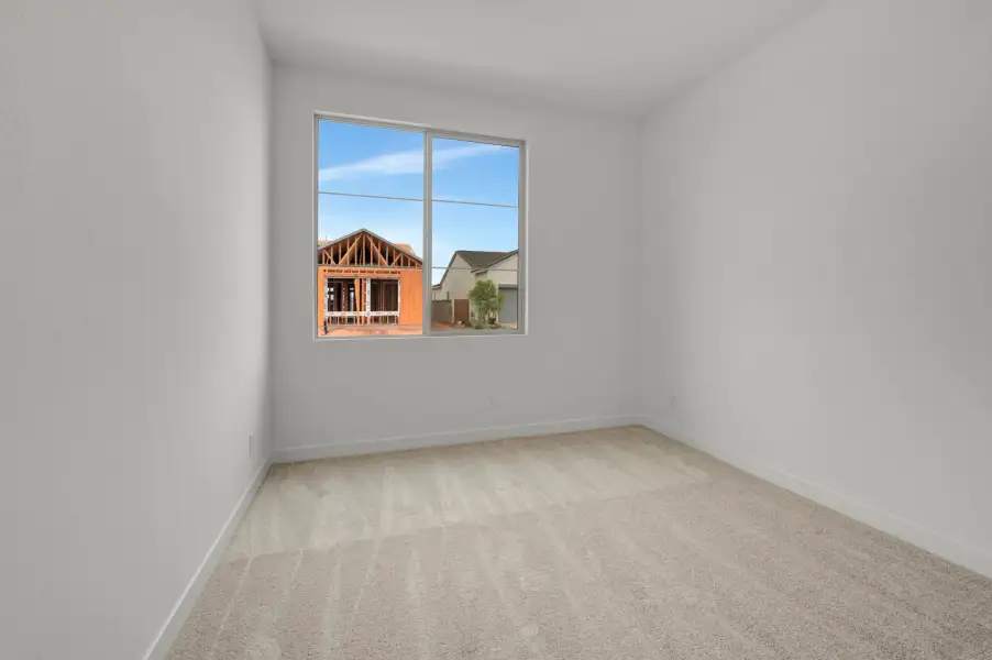 Spacious, unfurnished interior of a new home in Soleo, San Tan Valley (Image 39).