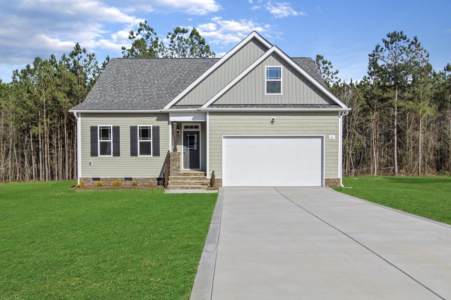 Representative exterior photo of a completed home built from the Hogan by RiverWILD Homes in Maggie Way, Wendell, NC (Image 2). Representative exterior photo of a completed home built from the Hogan by RiverWILD Homes in Maggie Way, Wendell, NC (Image 2).