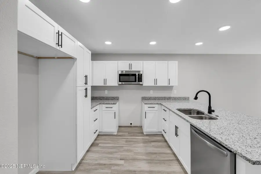 Furnished interior view inside a new home in , Jacksonville (Image 11). Furnished interior view inside a new home in , Jacksonville (Image 11).