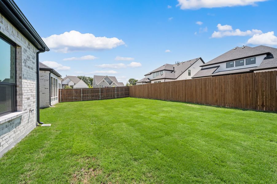 Exterior details and patio area of a home in Parks of Aledo, Aledo (Image 4).