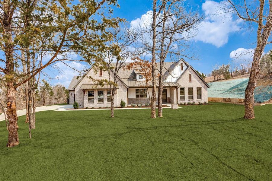 Front exterior of a new home in , Weatherford, TX, highlighting curb appeal (Image 30).