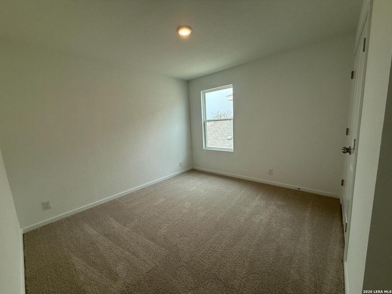 Spacious, unfurnished interior of a new home in Hennersby Hollow, San Antonio (Image 23).
