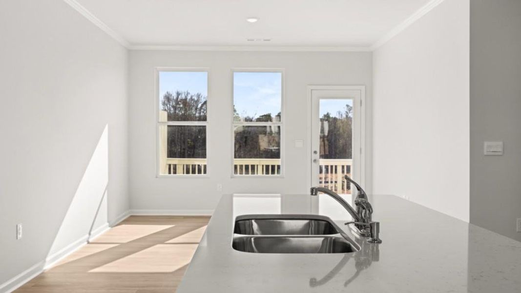 Furnished interior view inside a new home in Waypoint, Flowery Branch (Image 3).