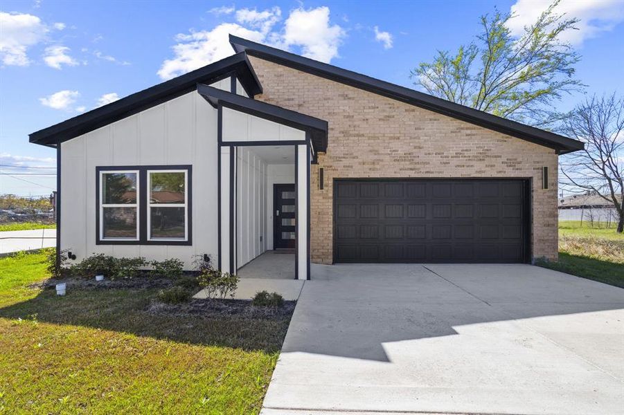 Front exterior of a new home in , Gun Barrel City, TX, highlighting curb appeal (Image 2). Front exterior of a new home in , Gun Barrel City, TX, highlighting curb appeal (Image 2).