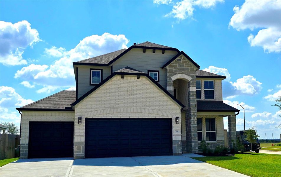 Front exterior of a new home in Beacon Hill, Waller, TX, highlighting curb appeal (Image 2).