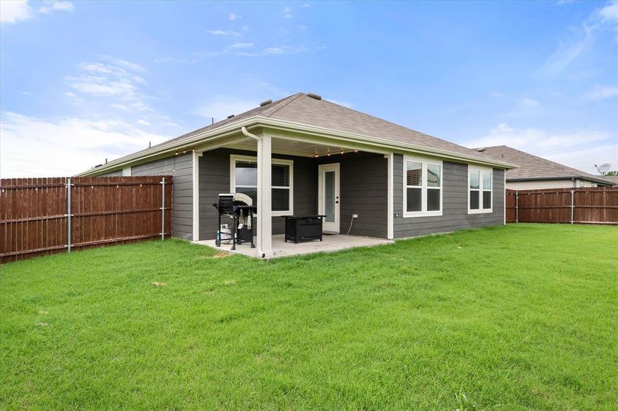 Exterior details and patio area of a home in Corsicana Commons, Corsicana (Image 21).
