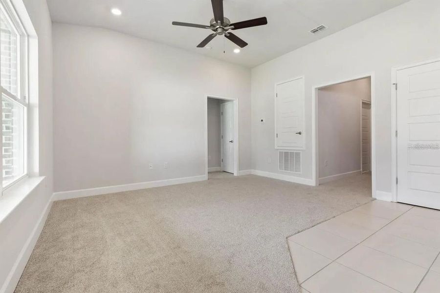 Representative unfurnished interior of a home built from the 1512 by Adams Homes in Winding Oaks, Weeki Wachee (Image 26).