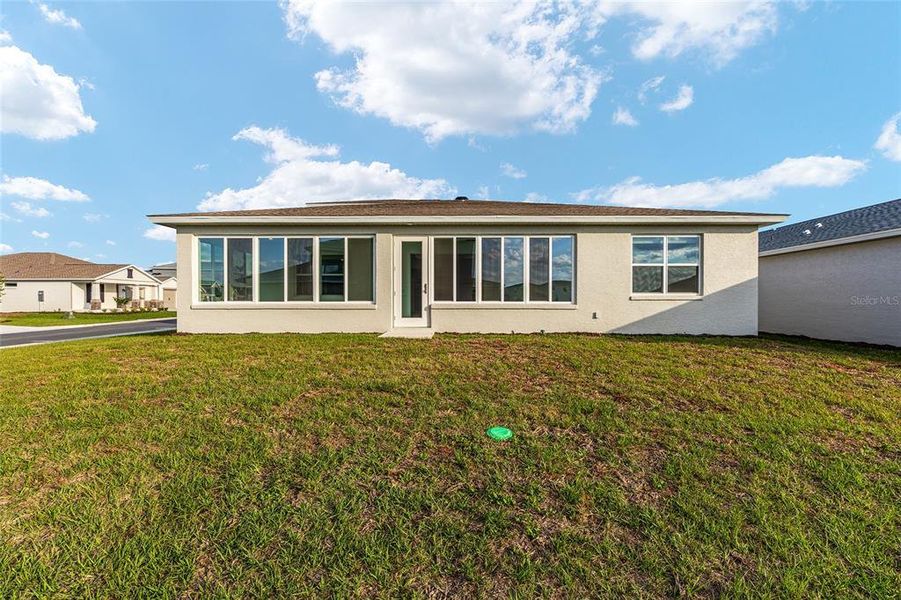 Exterior details and patio area of a home in Calesa Township, Ocala (Image 21).