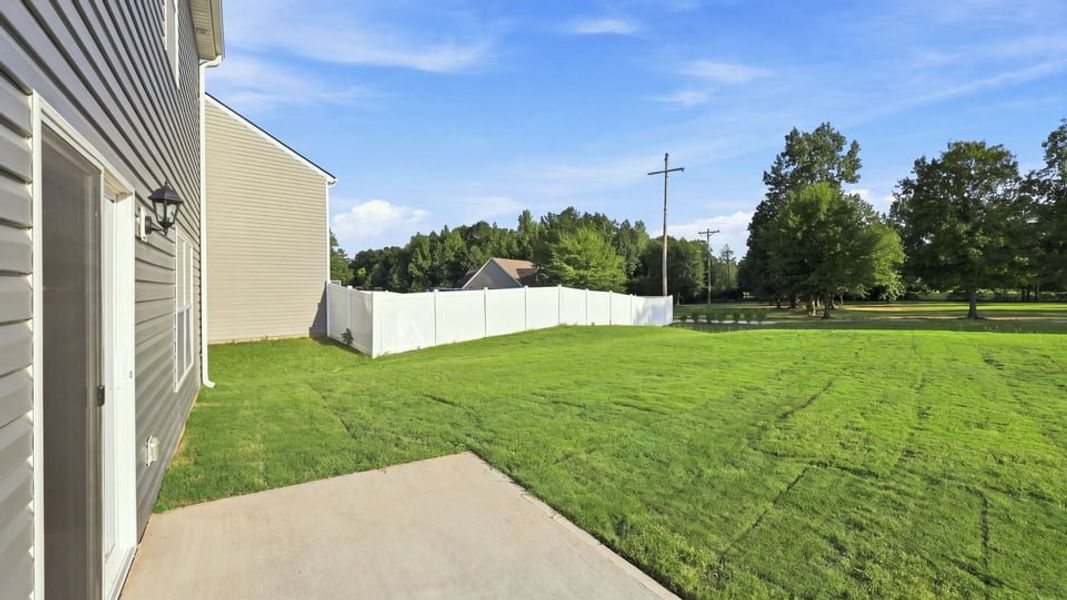 Exterior details and patio area of a home in Harper Ridge, Roebuck (Image 20).