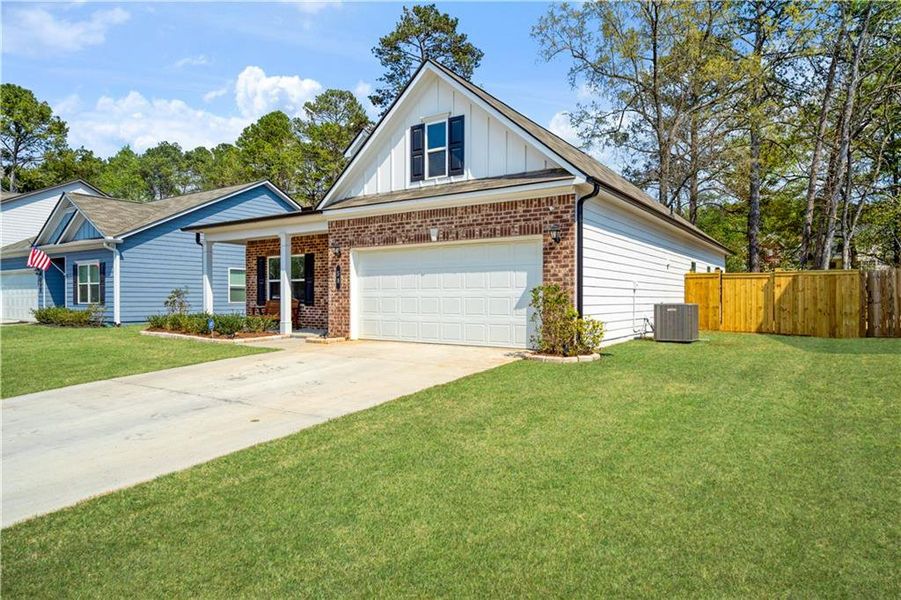 Front exterior of a new home in , Rome, GA, highlighting curb appeal (Image 24). Front exterior of a new home in , Rome, GA, highlighting curb appeal (Image 24).