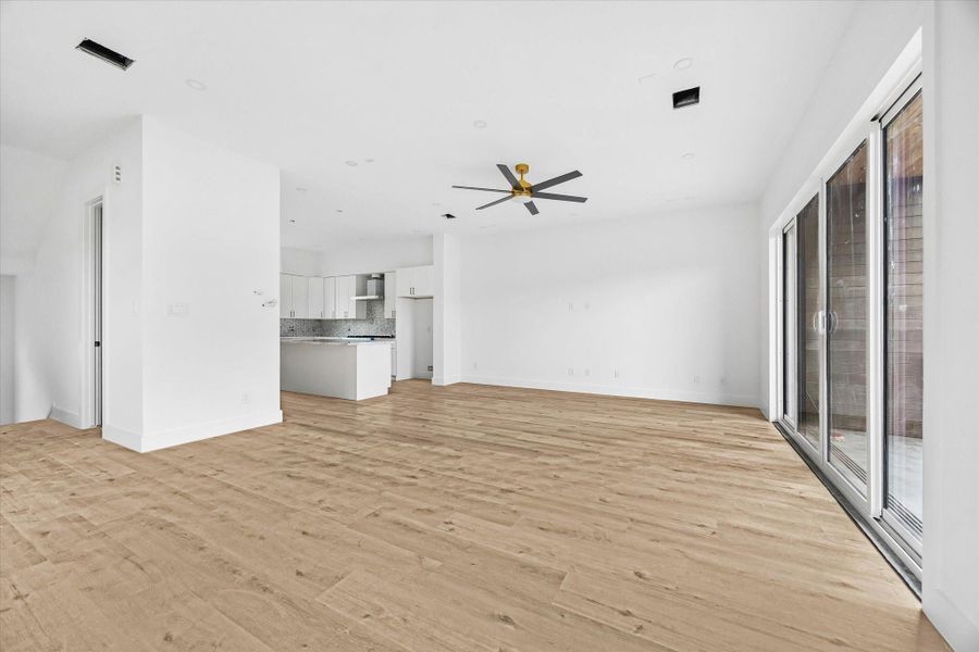 The open floor plan offers an ideal setting for both comfortable everyday living and effortless entertaining.