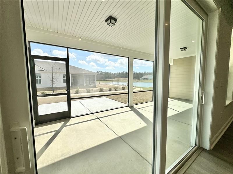 Exterior details and patio area of a home in Forestwood, Longs (Image 3).