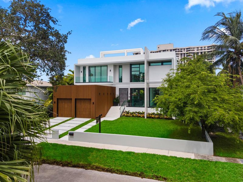 Front exterior of a new home in , Miami Shores, FL, highlighting curb appeal (Image 23).