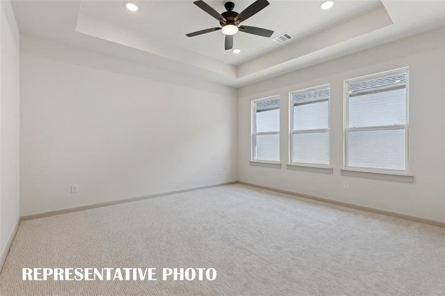 Your new owner's suite is light filled and located at the rear of the home for additional privacy.  REPRESENTATIVE PHOTO