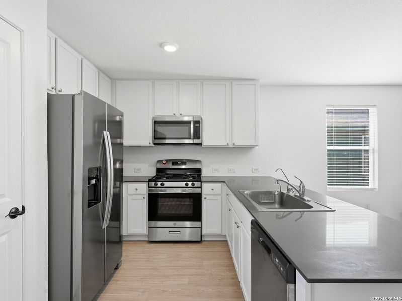 Furnished interior view inside a new home in Torian Village, San Antonio (Image 5).