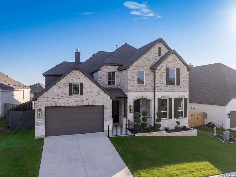 Front exterior of a new home in Ventana, Bulverde, TX, highlighting curb appeal (Image 32).
