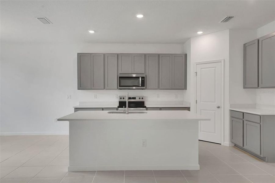 Furnished interior view inside a new home in Annabelle Estates, Winter Haven (Image 6).