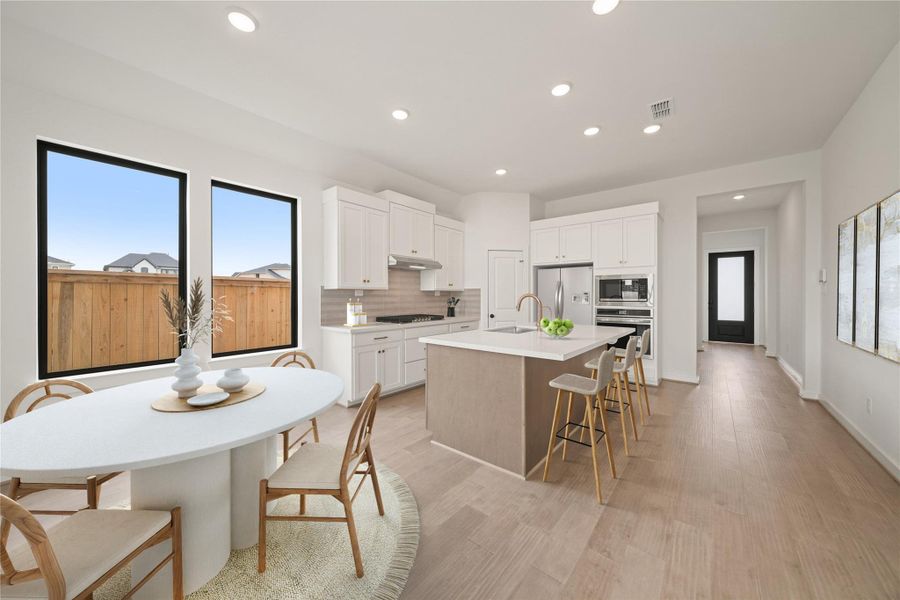 Furnished interior view inside a new home in Bridgeland 45', 50', 70', Cypress (Image 2). Furnished interior view inside a new home in Bridgeland 45', 50', 70', Cypress (Image 2).