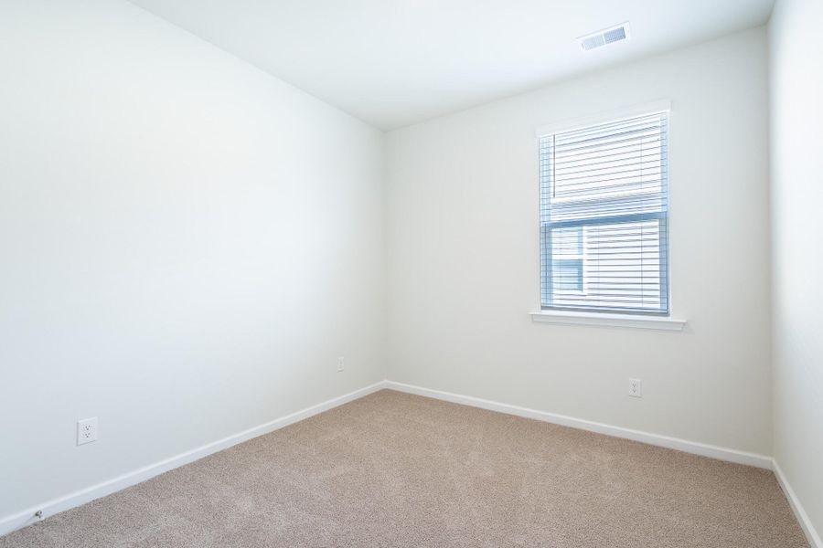Spacious, unfurnished interior of a new home in Pine Hills at Cane Bay, Summerville (Image 6).