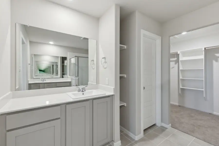Primary Bathroom in the Harrison home plan by Trophy Signature Homes – REPRESENTATIVE PHOTO Primary Bathroom in the Harrison home plan by Trophy Signature Homes – REPRESENTATIVE PHOTO