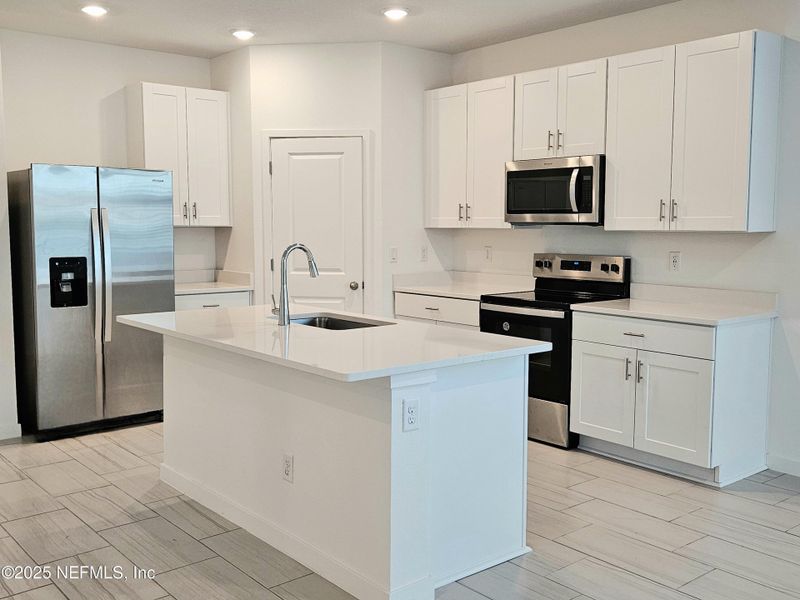 Furnished interior view inside a new home in Lakes at Bella Lago - Signature Series, Green Cove Springs (Image 10).