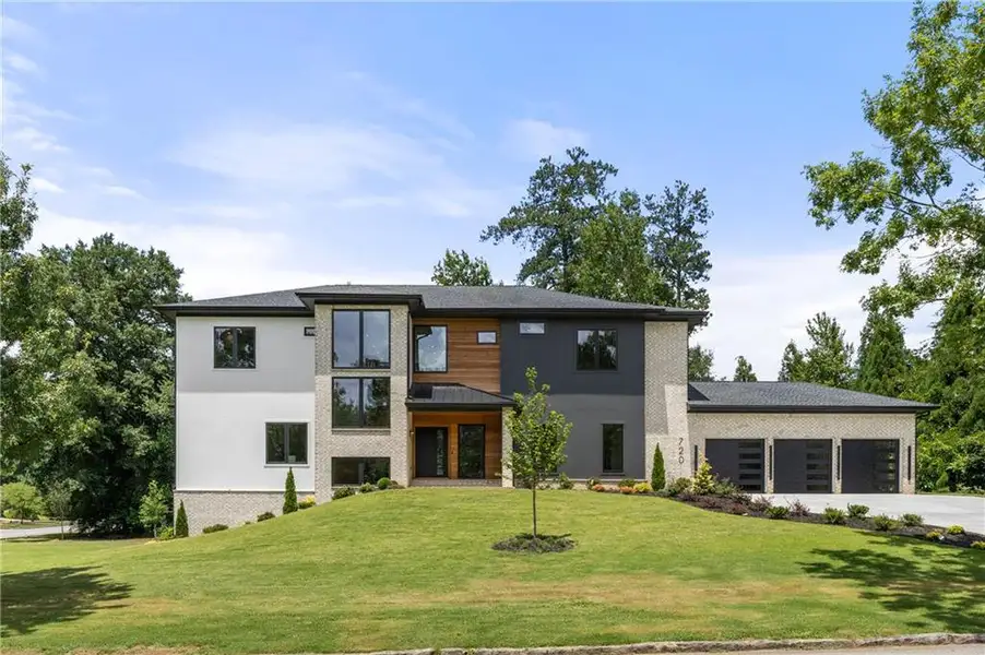 Front exterior of a new home in , Sandy Springs, GA, highlighting curb appeal (Image 29). Front exterior of a new home in , Sandy Springs, GA, highlighting curb appeal (Image 29).