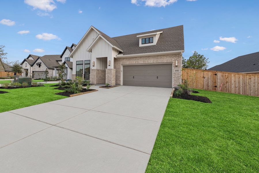 Front exterior of a new home in Kresston, Montgomery, TX, highlighting curb appeal (Image 1).