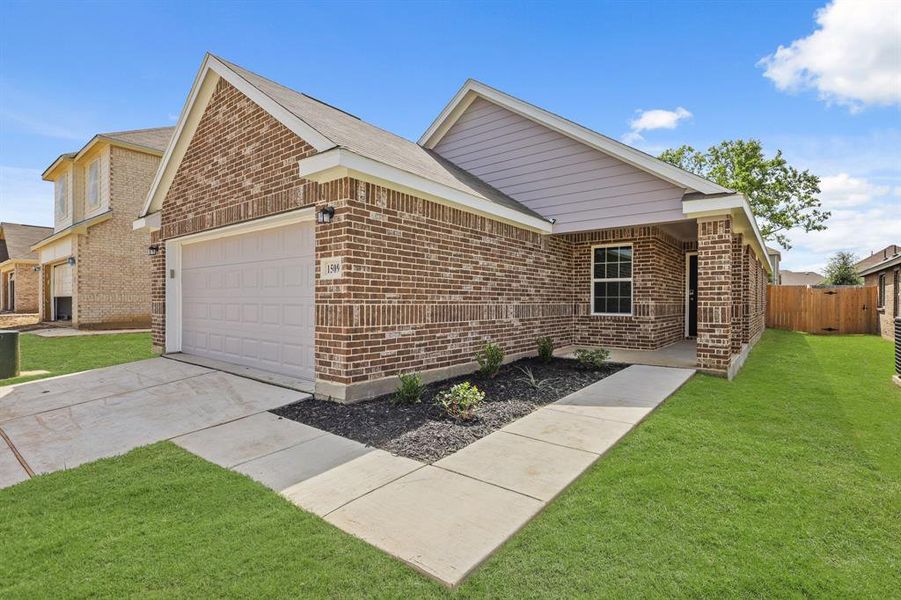 Front exterior of a new home in Christian Meadows, Ennis, TX, highlighting curb appeal (Image 1).