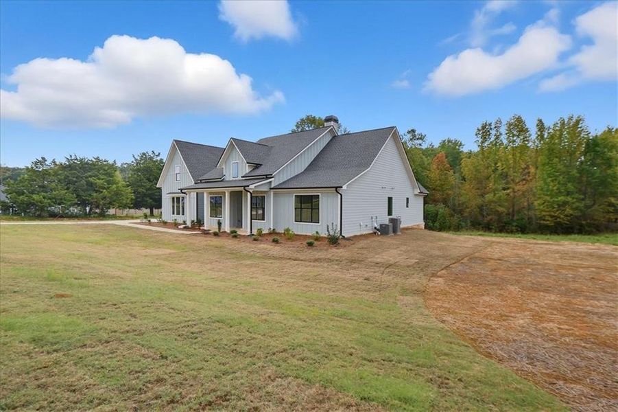 Exterior details and patio area of a home in Old Town Estates, Dacula (Image 18).