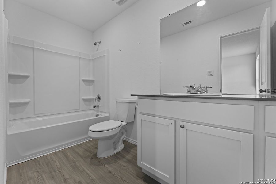 Furnished interior view inside a new home in Lodi Grove, Floresville (Image 3).